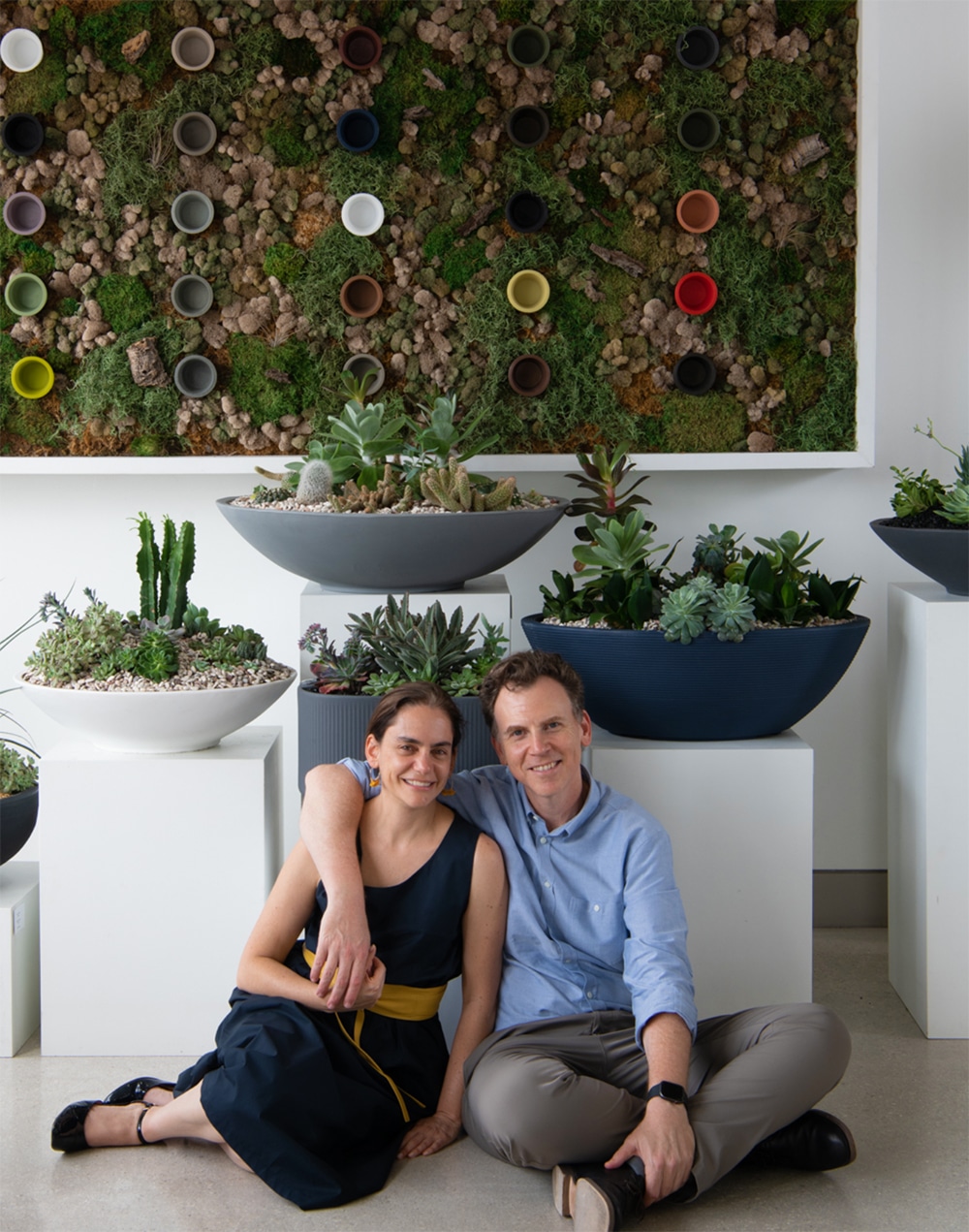 couple in front of planters