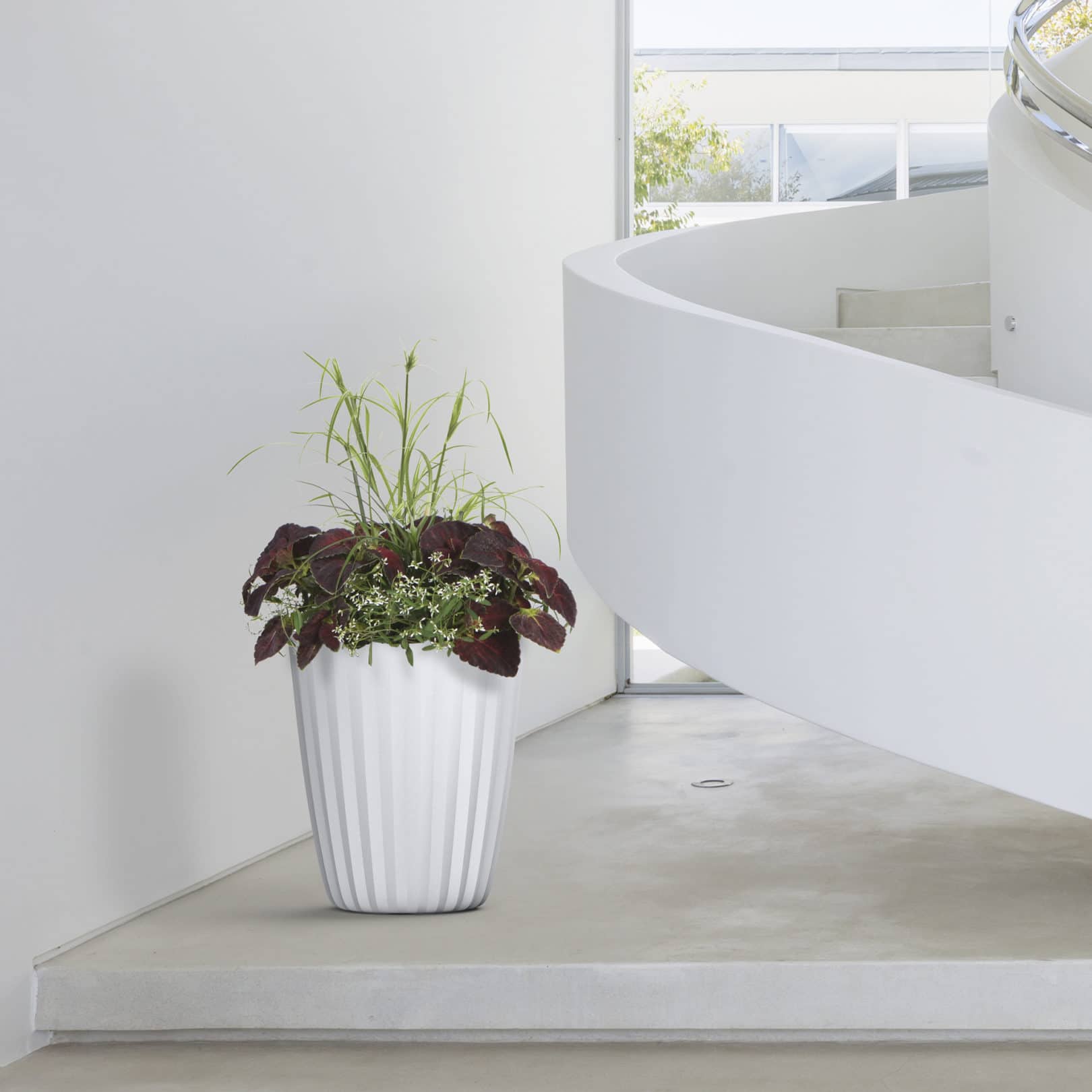 Curving Stairwell with Pleat Planter