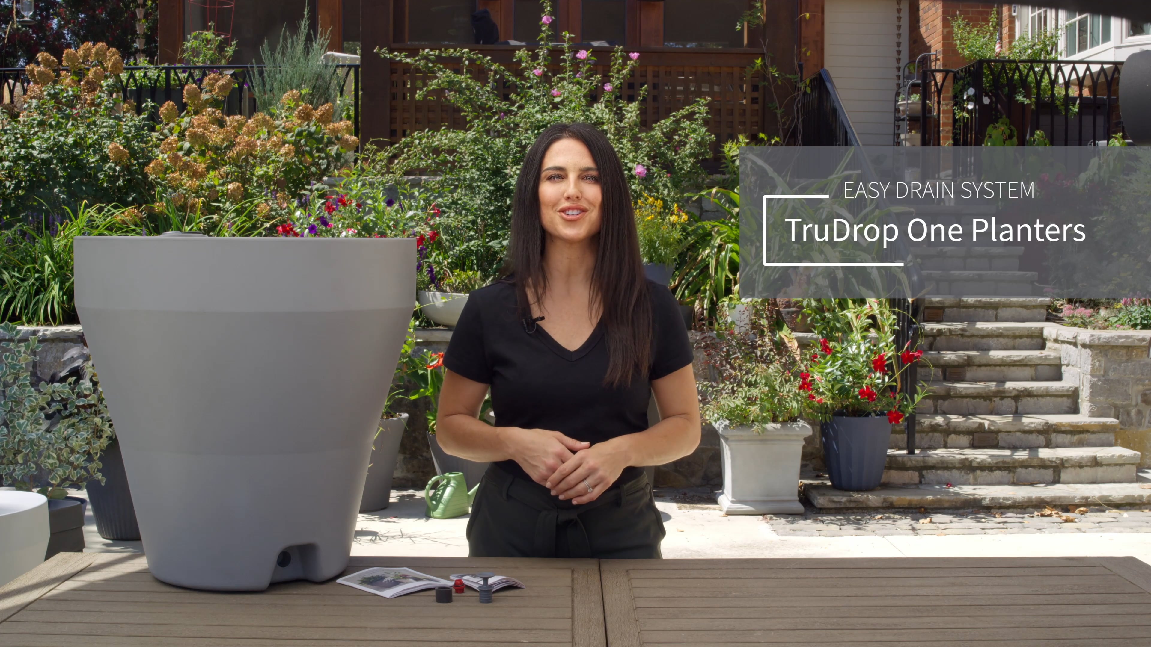 Video thumbnail: Easy Drain System for TruDrop One Planters with presenter on garden patio