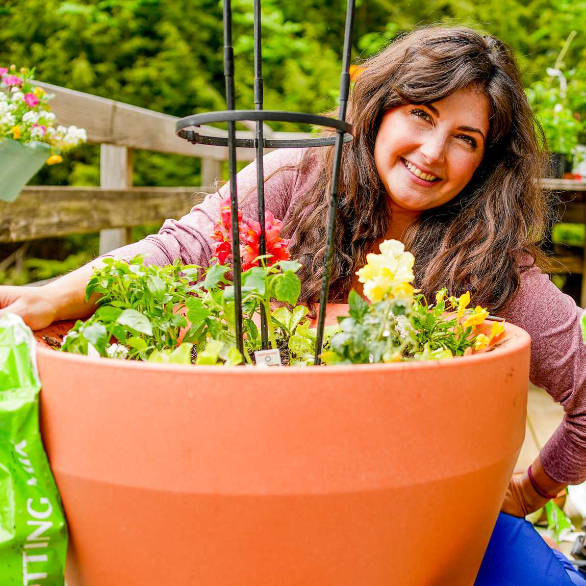 Girl gardening in Rim planter
